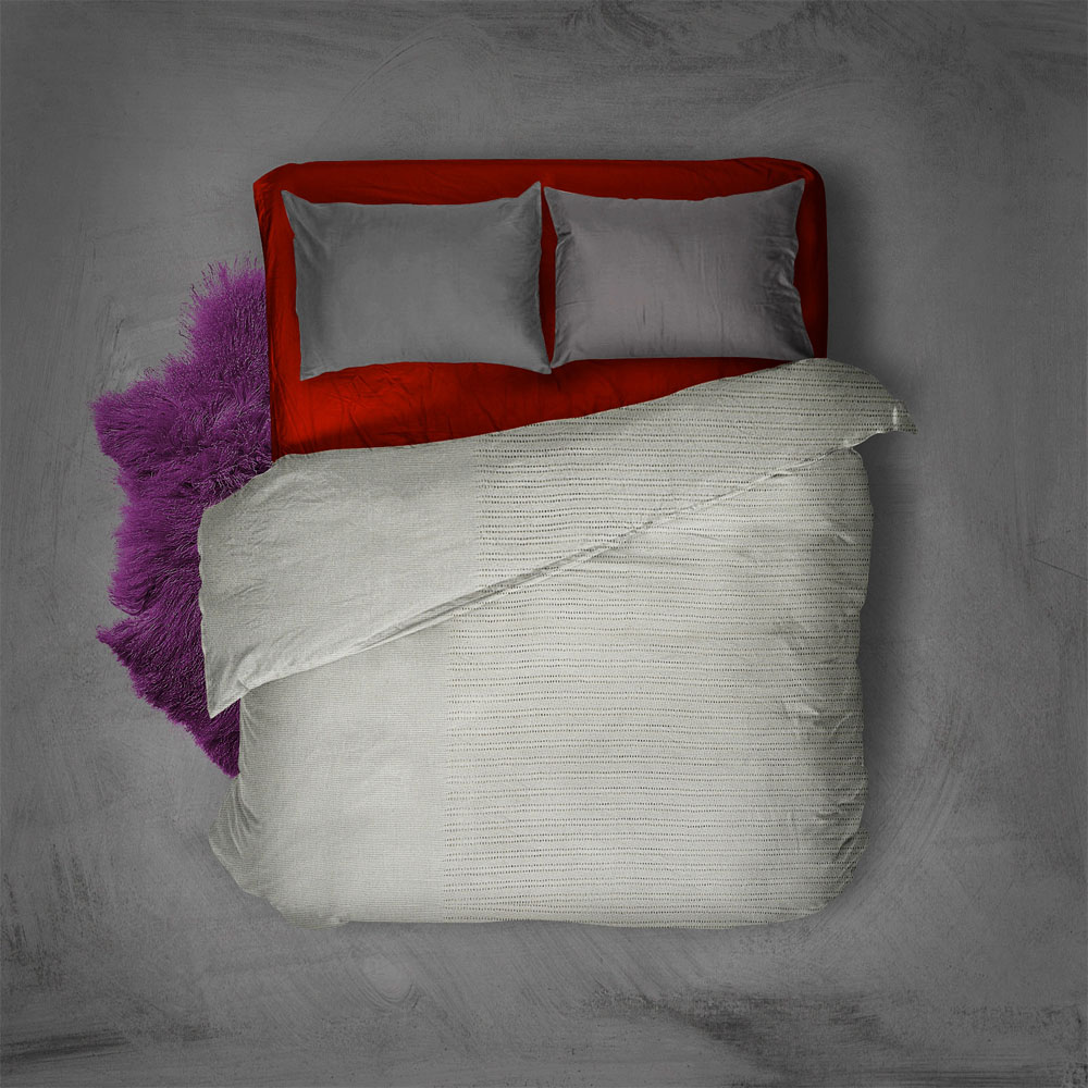Folded thermal blanket in a soft neutral shade
