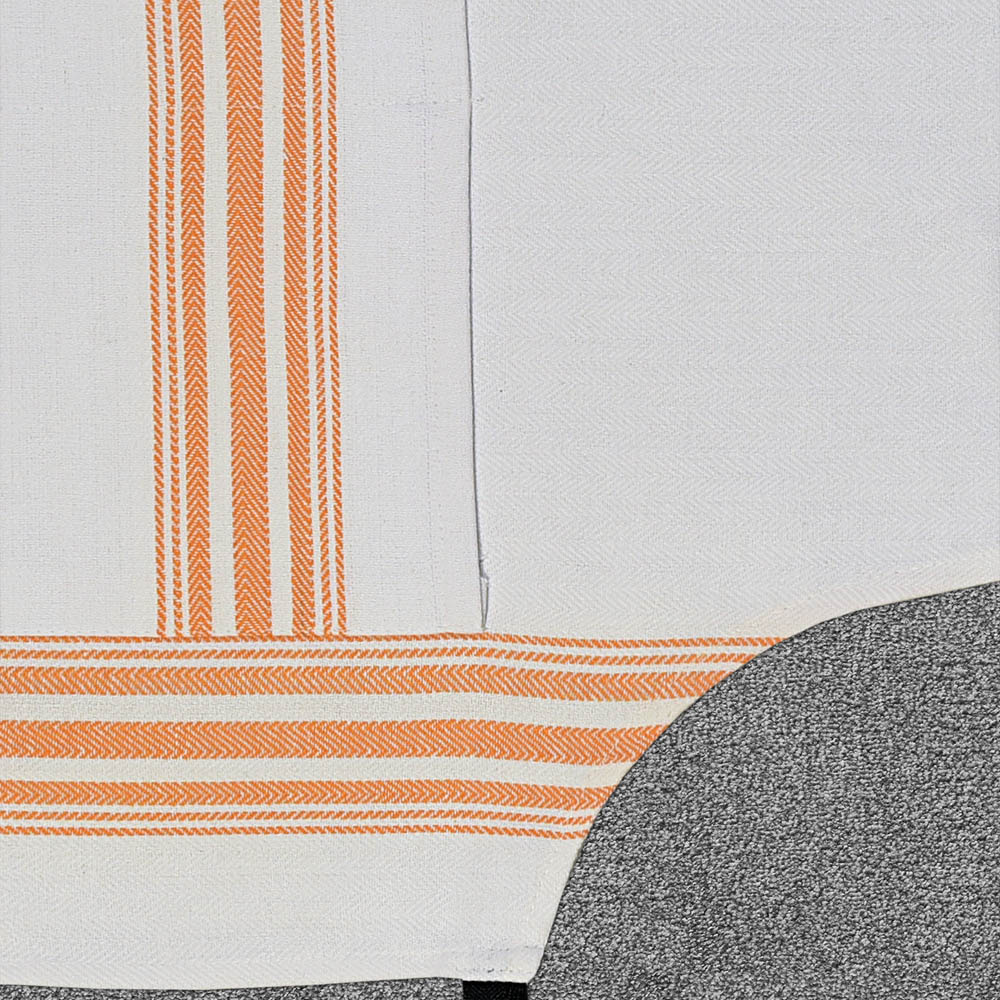 Close-up of striped table linen weave and border