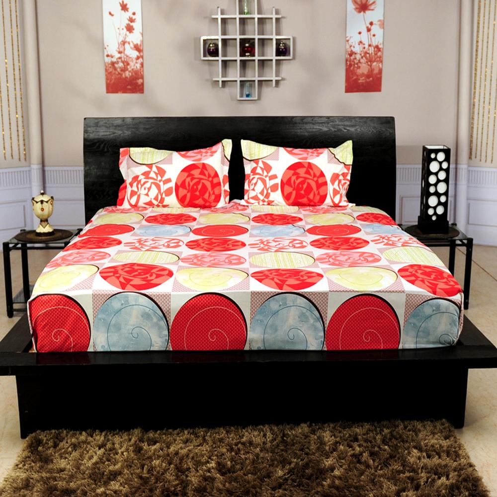 Stack of folded bedsheets in assorted colours