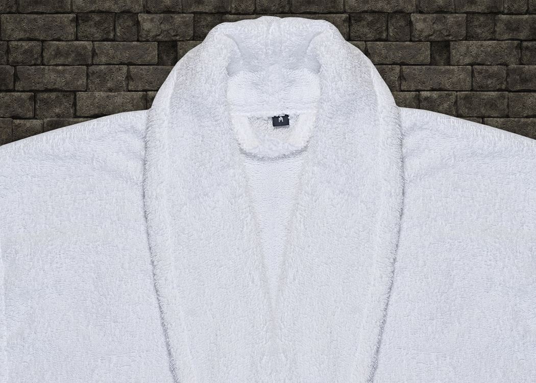 Close-up of terry bathrobe fabric and collar on a hanger