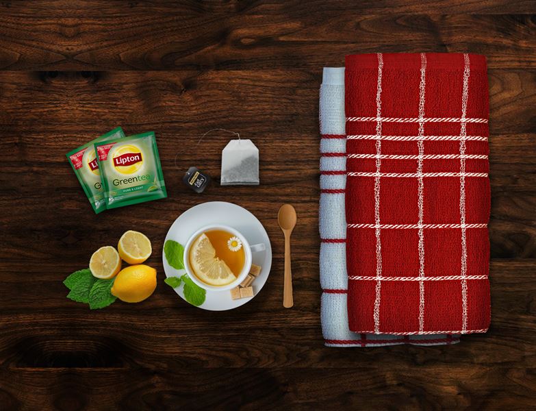 Pair of folded kitchen towels side by side